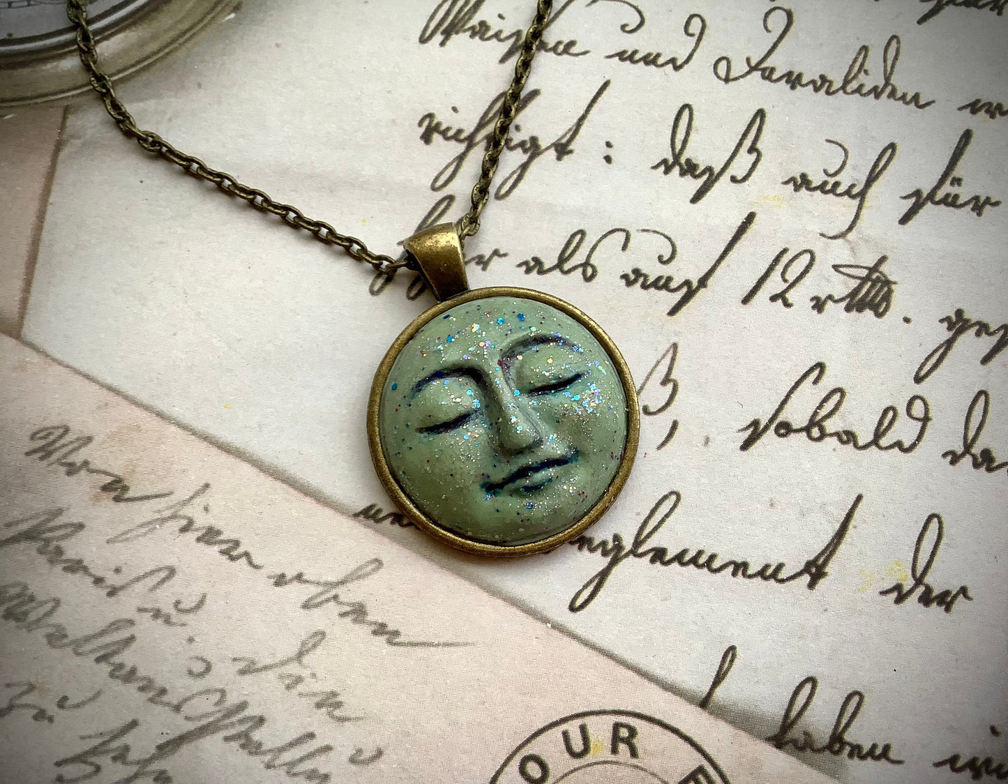 Moon pendant, hand pressed molded clay man on the moon, magical moon pendant necklace, peaceful face
